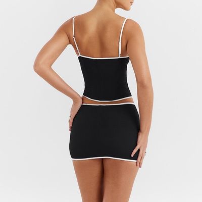 Custom new color contrast hollow halter skirt two-piece fashion suit