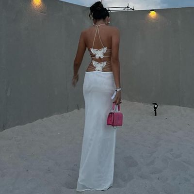 Europe and the United States sexy street new women's hollow custom splicing bow tie slim long double-layer halter dress