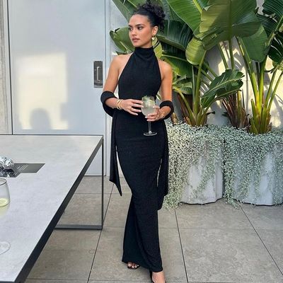 Fashion temperament new sexy blockbuster halter halter slim splicing sleeve long bright silk dress